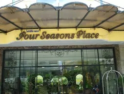 Four Seasons Place